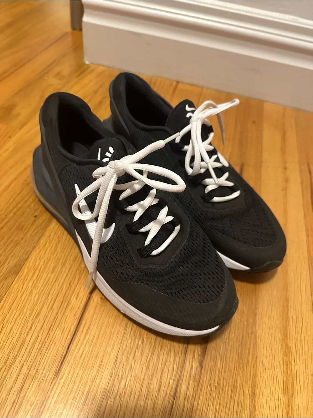 Nike women’s Black and White Sneakers